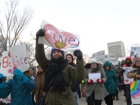 Protestors rally at Victory Park against the recent policy decision of U.S. president Donald Trump.