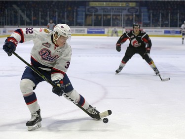 Regina Pats forward Robbie Holmes makes a nifty rebound shot for a goal against the Moose Jaw Warriors.