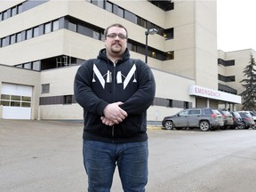 Taylor Thomas outside of the Pasqua Hospital by the Emergency department in Regina.  On Feb. 13, Thomas went to the Pasqua Hospital's ER where he says he sat on the floor by the triage desk until he was seen by a doctor because the department was so overcrowded.