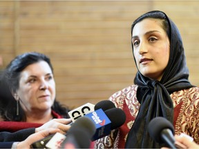 University of Regina President Vianne Timmons, left, and Zainab Azadbakht, sessional lecturer, speak at the University of Regina on Feb.3, 2017.