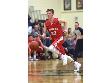 Raymond Comets guard Chase Bohne at the Luther Invitational Tournament held at the Luther College High School gym.