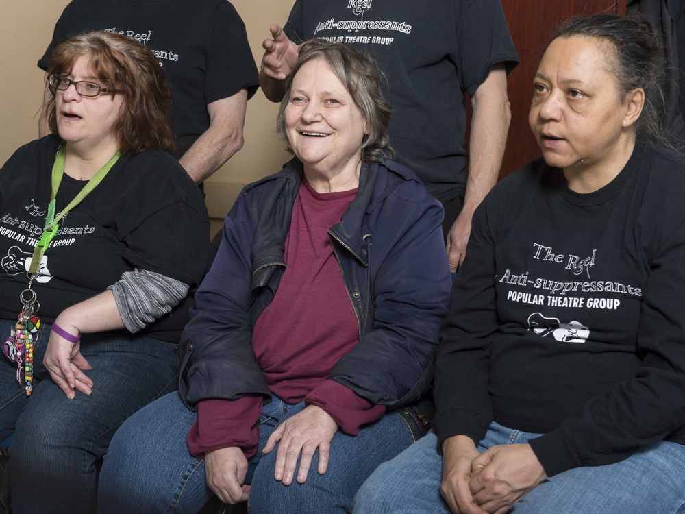 REGINA, SASK : January 30, 2017 - Carol Christiansen, center, member of the Reel Anti-Suppressants Popular Theatre Group, cannot help herself from smiling for the camera during a rehearsal at the Regina office of the Canadian Mental Health Association. Roxanne Cherpin, left, and Linda Cunningham, sing. MICHAEL BELL / Regina Leader-Post.