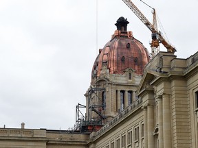 REGINA SK: JULY 04, 2016 – As the scaffolding comes down from a $21 million,  2 1/2 year restoration, one can see the copper dome of the Saskatchewan Legislative building in Regina.  DON HEALY / Regina Leader-Post
