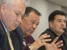 Left-Right  Ron S. Maurice, counsel for Beardy's & Okemasis First Nation, Beardy's Chief Rick Gamble and FSIN Chief Booby Cameron speak to the media after the announcement of the $4.5 million dollar land claim settlement to 14 different first nations,  December 27, 2016.