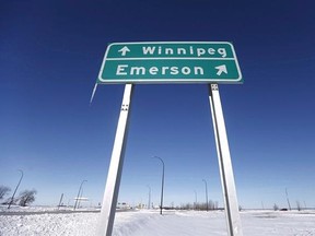 A road sign is seen near Emerson, Man., Thursday, February 9, 2017. Advocates are concerned about unaccompanied minors seeking asylum in Canada. THE CANADIAN PRESS/John Woods