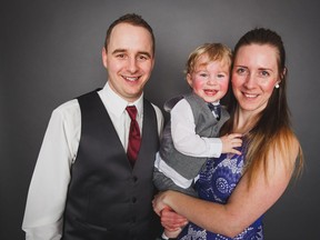 A photo taken in January of Jeremy, Jennifer and Bennett Flegel at a friend's wedding.