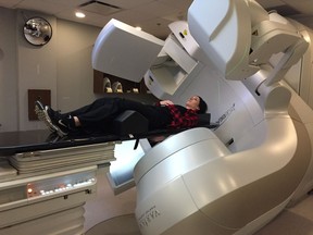A TrueBeam linear accelerator was recently installed in the Allan Blair Cancer Centre in Regina. Shown above is Stacey Wiens, a radiation therapist at the centre, laying in the machine during a demonstration. PHOTO ASHLEY ROBINSON