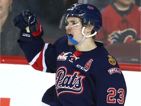 Regina Pats centre Sam Steel celebrates his hat-trick goal during Tuesday's 5-2 WHL playoff victory over the host Calgary Hitmen.