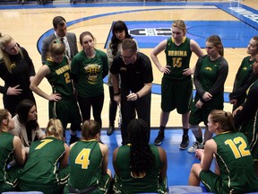 University of Regina Cougars head coach Dave Taylor addresses his players at the 2017 U Sports women's basketball championship in Victoria.