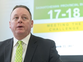 Minister of Finance Kevin Doherty speaks during a news conference at the Legislative Building.