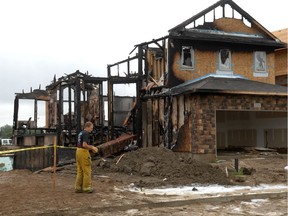 Fire destroyed three homes on Brookview Drive in Fairways West, a Regina subdivision located next to the Joanne Goulet Golf Course, in northwest Regina on Aug. 13 2010.