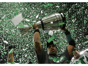 Kerry Joseph, shown celebrating the Saskatchewan Roughriders' Grey Cup victory in 2007, has some advice for newly signed quarterback Vince Young.