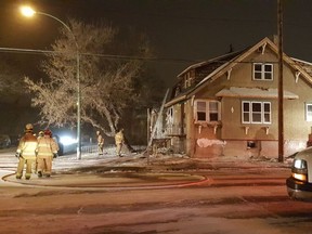 Regina firefighters were at the scene of a house fire at the corner of Robinson Street and 5th Avenue early Tuesday morning.