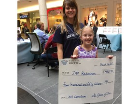 Olivia McKechnie with Paulette Darjes, one of the NICU nurses who helped her beat the odds nine years ago.