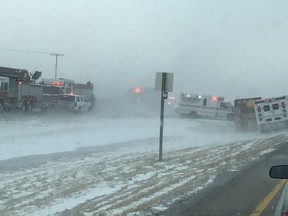 Police, fire departments and EMS were all on the scene of what was being called a 10-car crash on the Trans-Canada Highway west of Regina near Pense on Tuesday afternoon. The Trans-Canada was shut down on both sides of the city - from Balgonie to Belle Plaine - after the crash with visibility near zero. Photo courtesy Jason Hannant.