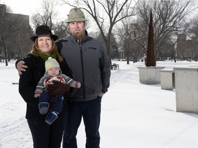 REGINA, SASK : March 12, 2017 - Kerri Van Loosen, left, stands with her husband Bryce and son Adler at the northeast corner of Victoria Park, where a public sculpture - a glockenspiel - used to stand. A city hall report on the glockenspiel's refurbishment and installation will come out this week.