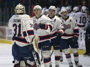 The Regina Pats celebrate a goal by Josh Mahura on Tuesday against the Saskatoon Blades. Regina won 5-4 to clinch first place in the WHL's overall standings for the first time since 1974.