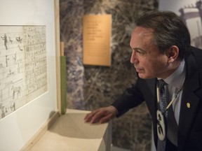 Assembly of First Nations National Chief Perry Bellegarde looks at the Chief Paskwa pictograph at the Royal Saskatchewan Museum in Regina.