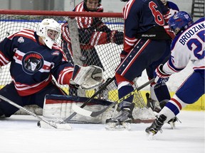 Preston Brodziak, right, scores on Tisdale Trojans goaltender Zach Johnson on Tuesday in Saskatchewan Midget AAA Hockey League playoff action at the Co-operators Centre. Regina won 4-1 to sweep the best-of-five championship series. The Pat Canadians advance to the Telus Cup prairie regional tournament, March 30-April 2 in Steinbach, Man.