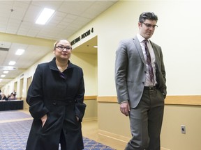 Delores Stevenson, left, aunt of Nadine Machiskinic, walks with the family's lawyer Noah Evanchuk at the Queensbury Centre. A death inquest begins today into Machiskinic, 29, who was found injured at the bottom of a laundry chute at the Delta Hotel on Jan. 10, 2015 and died in hospital two hours later.