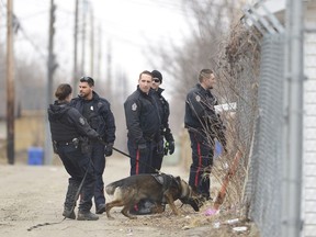 Regina Police Service in an alley near the corner of 5th Ave. and Retallack St.