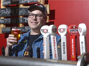 Mark Heise of Rebellion Brewery pours a pint. Heise wants clarity about whether or not Rebellion beer will be sold at Mosaic Stadium in the coming year. MICHAEL BELL / Regina Leader-Post.