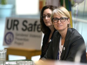 Roz Kelsey looks on at a press conference about the results of a study on gender-based violence at the University of Regina. Kelsey will serve as the university's first director of gender violence prevention strategies.