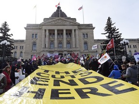 Hundreds attend a noon hour rally at the Legislative Building in early March protesting proposed cuts by the Sask. Party government.