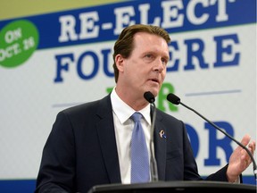 Mayor Michael Fougere lays out his election platform at his campaign headquarters in Regina in October last year.