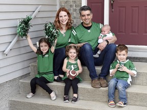 Roughriders fans Kelsey and Zack Dumont, along with their kids (from left) six-year-old Juliet, two-year-old Rose, two-month-old Wells and three-year-old Oliver.