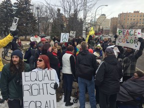 Supporters of the Canadian Coalition of Concerned Citizens chant back and forth with counter protesters about M-103 during a protest at Regina City Hall on Saturday, Mar. 4. PHOTO/Ashley Robinson