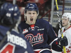 Filip Ahl of the Regina Pats celebrates his team's third goal of the night during WHL action Saturday at Mosaic Place. Regina hung on for a 4-3 win over the Moose Jaw Warriors. Photo by Randy Palmer, Moose Jaw Times-Herald.