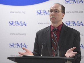 Roger Hayward, SUMA vice-president of towns, speaks during a Saskatchewan Urban Municipalities Association press conference held at the DoubleTree Inn.