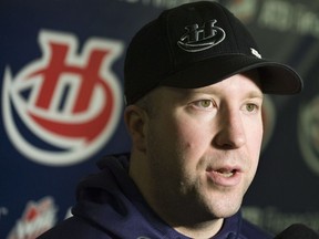 Lethbridge Hurricanes head coach Brent Kisio speaks with reporters Thursday before the team loaded up the bus for the trip to Regina to face the Pats in the Eastern Conference final.