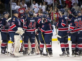 The Regina Pats celebrate after winning a first-round playoff series against the Lethbridge Hurricanes last year.