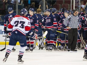 The Regina Pats celebrate a key victory over the Lethbridge Hurricanes in WHL playoff action Wednesday.