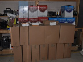 A 61-year-old Beatty woman is facing charges after police seized approximately 200,000 cigarettes, over $5,000 cash and a vehicle and cargo trailer.