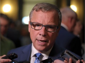 Premier Brad Wall speaks with members of the media following the 2017 budget speech at the Legislative Building in Regina Wednesday, March 22, 2017.