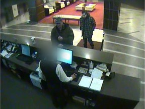 Regina police released this photo in May 2016 of two men in the lobby of the Delta Hotel on Jan. 10, 2015, around the time Nadine Machiskinic is believed to have entered the hotel and possibly rode the elevator with them. Police say they've exhausted all leads in trying to locate the men in hopes of learning what, if anything, they may recall. (Supplied by Regina Police Service)