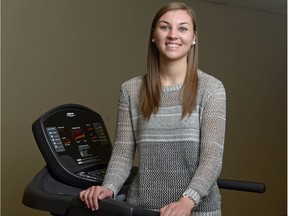 Psychology student Chloe Rudichuk stands on a treadmill at the Anxiety and Illness Behaviour Lab at the University of Regina. Rudichuk is conducting research to understand if aerobic exercise can improve spider phobia treatment outcomes.