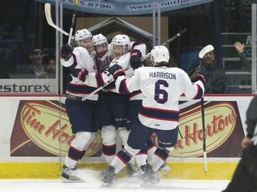 Regina Pats forward Filip Ahl, left, celebrates his breakaway goal during the seventh game of the series at the Brandt Centre.