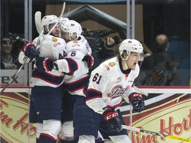 Regina Pats forward Filip Ahl, right, celebrates his breakaway goal during the seventh game of the series at the Brandt Centre.
