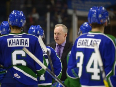 Regina Pats head coach John Paddock shakes hands with Swift Current Broncos players at the end of the seventh game of the series at the Brandt Centre. The Pats won the game 5-1.