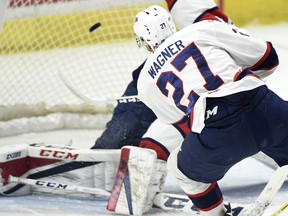 Regina Pats forward Austin Wagner beats Lethbridge Hurricanes goalie Stuart Skinner early in Friday's WHL playoff game at the Brandt Centre. TROY FLEECE / Regina Leader-Post