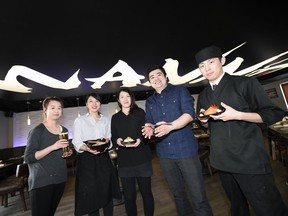 (From left) Jennifer Yee, Marie Hirota, Mana Garner, Tony Yang and Koreto Yamauchi work at Wann Izakaya, a Regina restaurant focused on good times and authentic Japanese food.