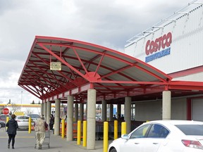 People leave and enter the parking lot of Costco at 665 University Park Dr.