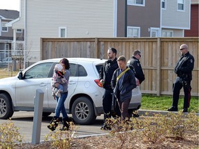 The Regina Police Service recover a stolen abandoned vehicle with a child, unharmed, still inside, in the area of Regency Cres. and 3rd Ave N, in  Regina.
