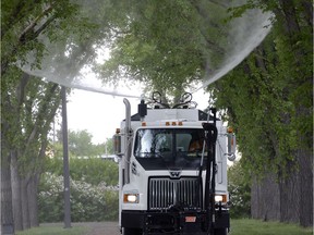 City workers spray for cankerworms during the summer of 2016.