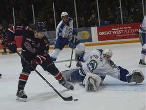 The Regina Pats' Dawson Leedahl outwaited Swift Current Broncos goaltender Jordan Papirny for the second goal of the contest during Game 4 of a WHL playoff series at the Credit Union iplex.