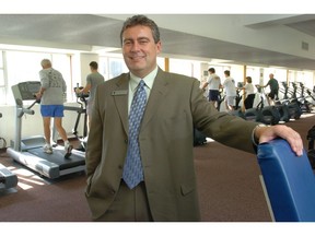 Randy Klassen, former CEO of the YMCA of Regina, posing in one of the downtown location's workout rooms in 2005.